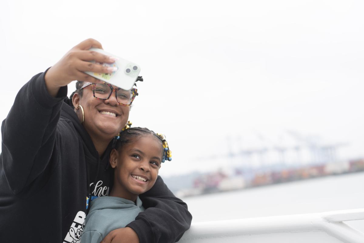 Guests take a selfie at the Port's 2025 free public boat tours